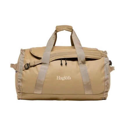 Frontal vy av slitstark beige Lava 90 duffelväska med dubbla handtag