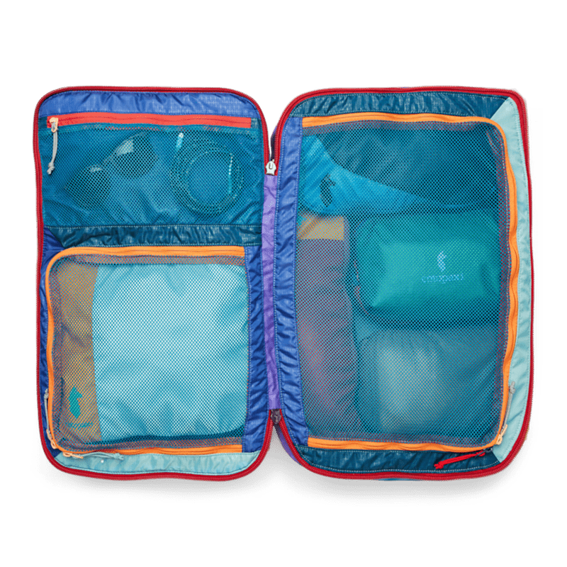 Öppen Cotopaxi Allpa 35L reseryggsäck som resväska med meshfack och packkuber